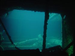 Looking from Hold 1 into Hold 2 SS Thistlegorm....was goi... by Harvey Page 